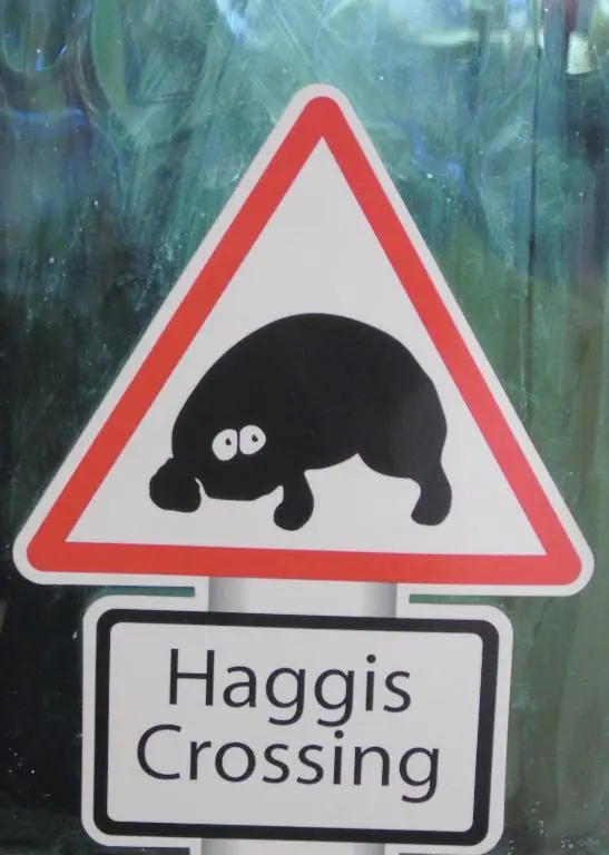 a street sign with a panda bear on it at Craik Na Dav B&B in Invermoriston