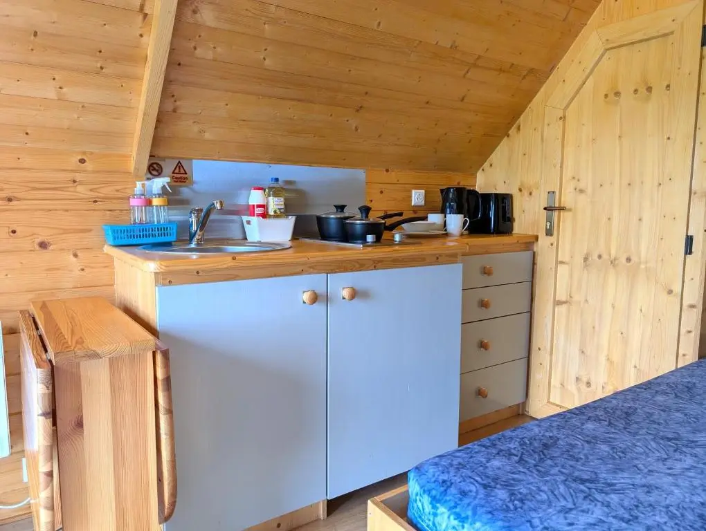 a kitchen with a sink and a counter top at Macbeth's Hillock in Forres