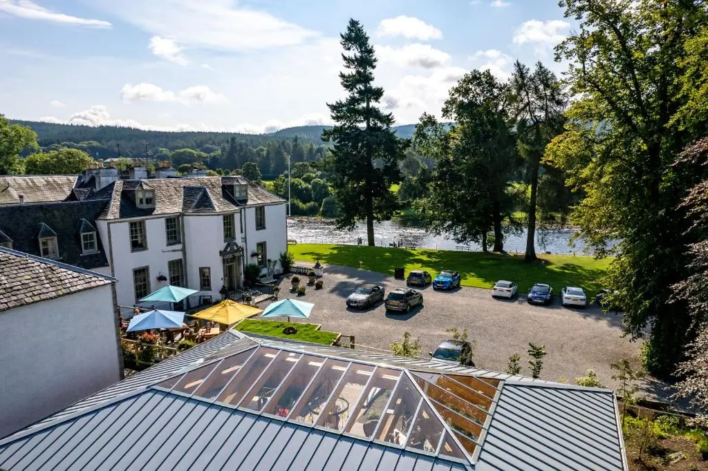 an aerial view of a building with a parking lot at Banchory Lodge Hotel in Banchory