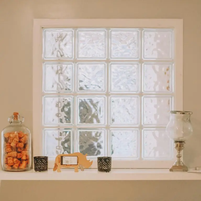 a window with a shelf with cups and a vase at The Black Isle Retreat in Inverness