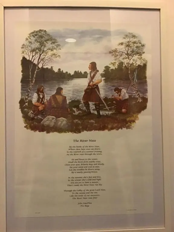 a framed picture of a painting of people on the water at Alba b & b in Inverness