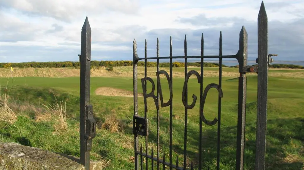 a gate with the words raider on a golf course at 3 St Gilbert Street in Dornoch