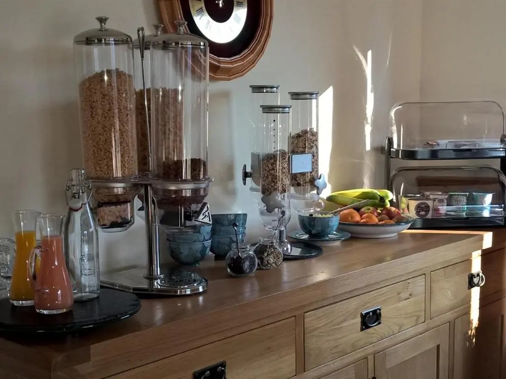 a kitchen with a counter with food on it at Binnilidh Mhor B&B in Glenmoriston