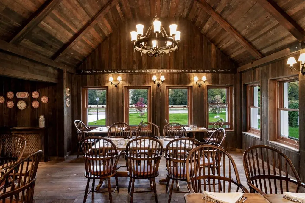 a dining room with a large table and chairs at Rokeby Manor in Invergarry