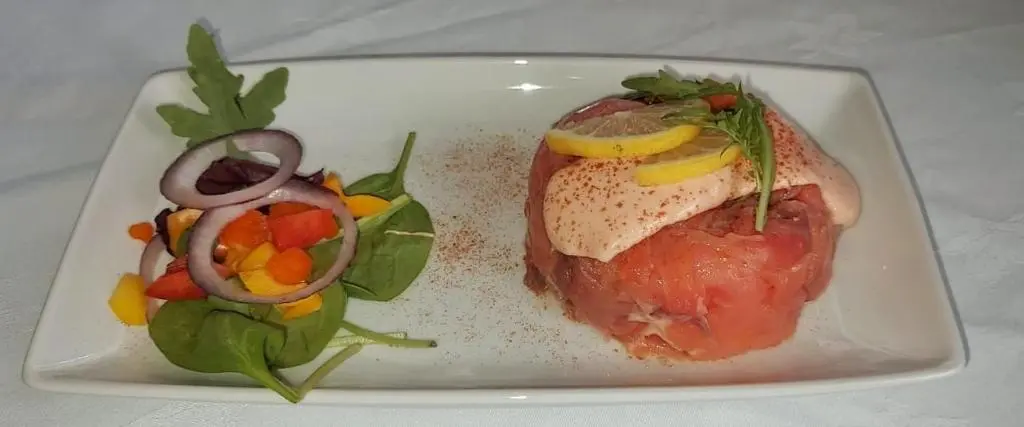 a plate of food with meat and vegetables on it at Gordon Arms Hotel in Fochabers