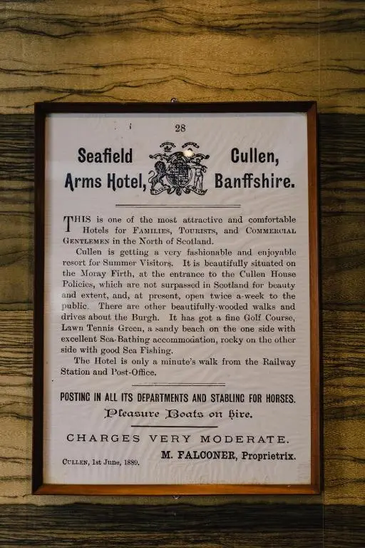 a sign that is on a wooden wall at The Seafield Arms-Cullen in Cullen