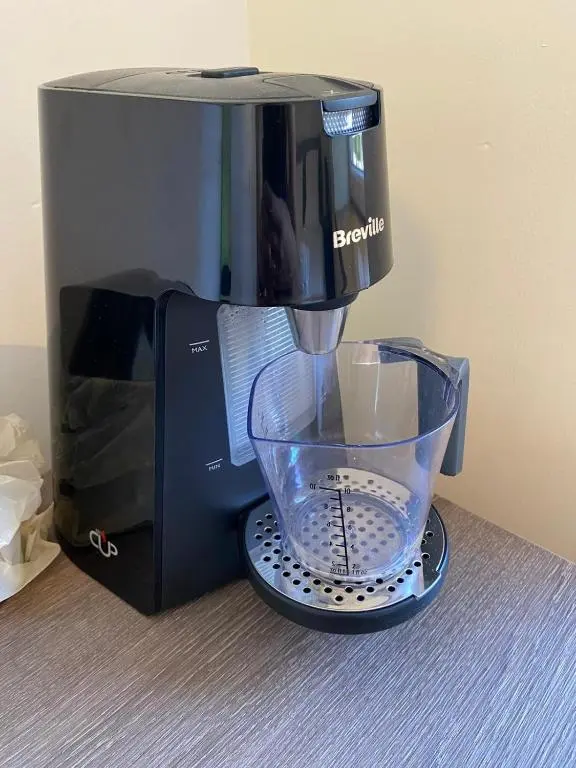 a black blender sitting next to a microwave at The Station Hotel Insch in Insch