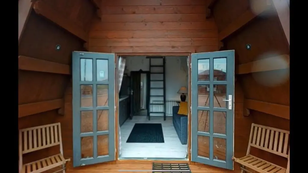 an open door of a house with a room at AC/DC Glamping in New Aberdour