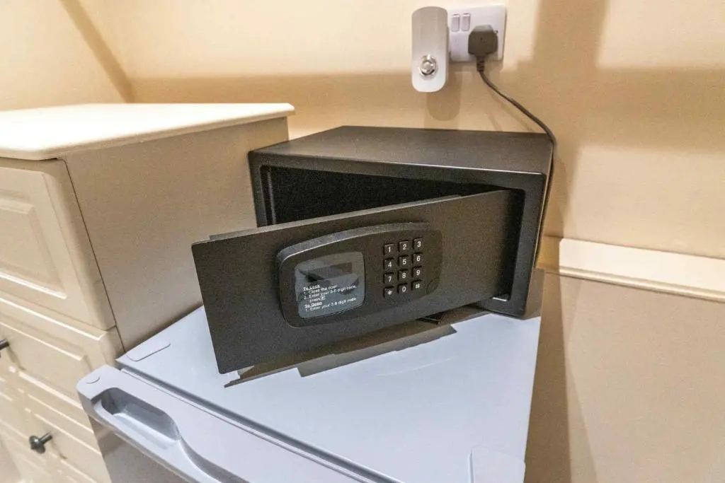 a microwave sitting on top of a refrigerator at Drumlochy B&B in Inverness