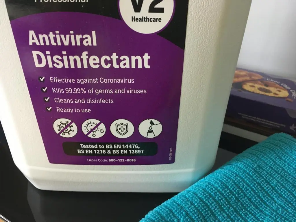 a bottle of antimalarial disinfectant on a shelf at Highfield apartment in Inverness