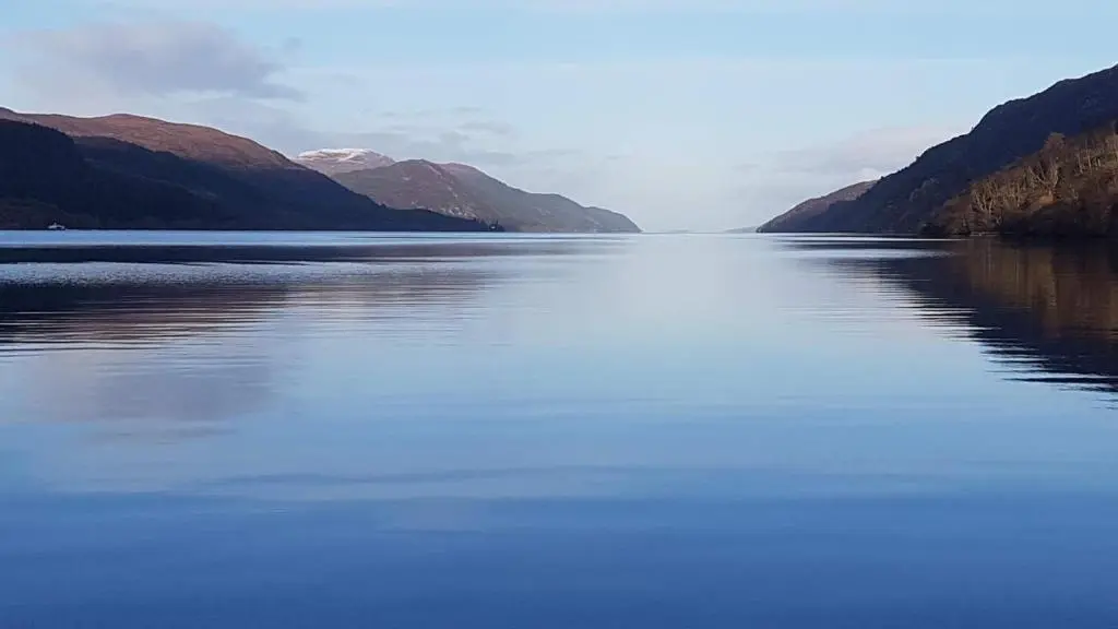 a large body of water with mountains in the background at Lorien House B&B in Fort Augustus