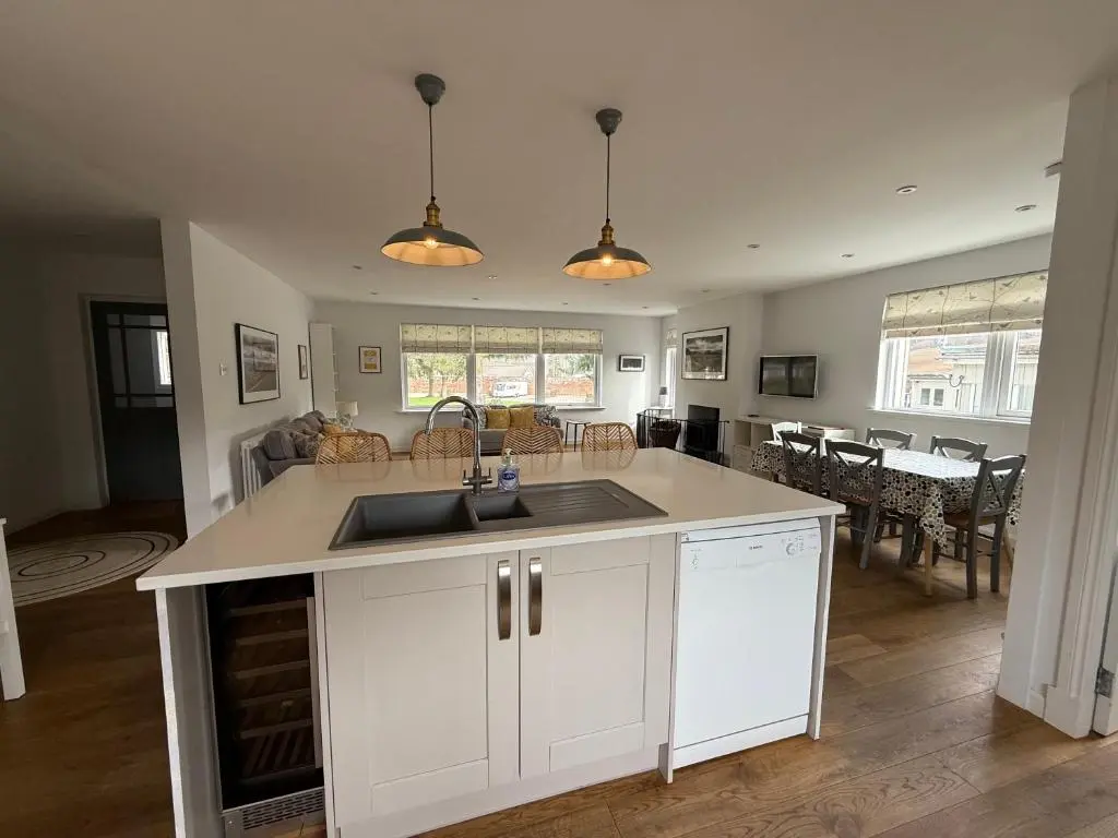 a kitchen with a sink and a counter top at The Salmon Hut in Aberlour