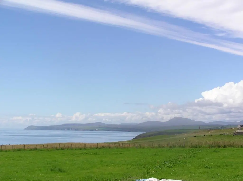 a view of a body of water from a field at The Antlers in Lybster