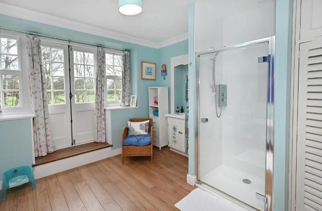 a bathroom with a shower and a toilet at Willowvale in Nairn