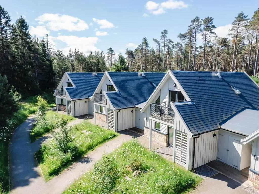 an aerial view of a row of houses at Otter Lodge in Kingussie
