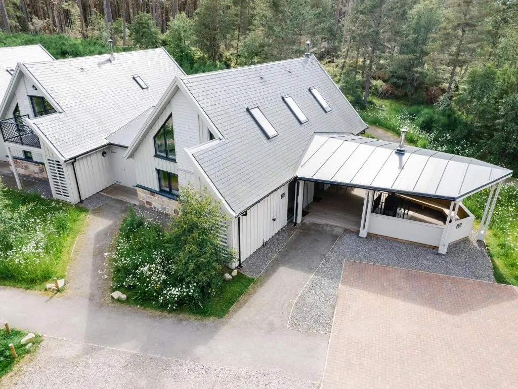 an overhead view of a house with a garage at Golden Eagle Lodge in Kingussie