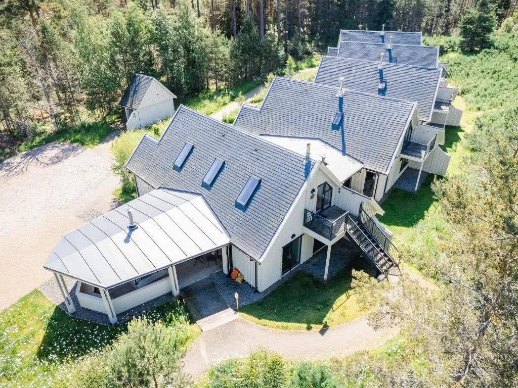 an aerial view of a row of houses at Osprey Apartment in Kingussie