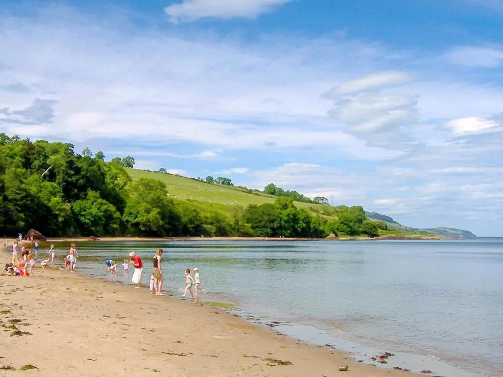 a group of people walking on the beach at Pine Lodge - Uk7049 in Glenurguhart