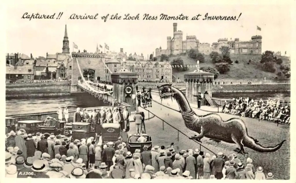 an old photo of a crowd of people watching a dinosaur at Caledonian 2 bedroom free parking in Inverness