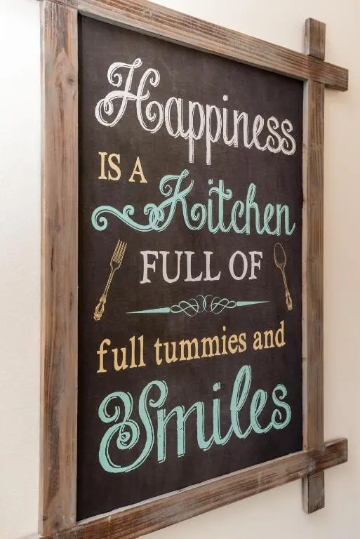 a chalkboard sign that says happiness is a kitchen full of full turnips at Historic Village, Rare Find, Amazing Views in Ballater