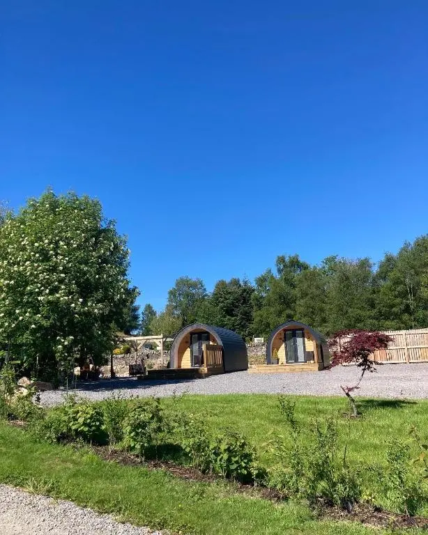a rendering of a couple of small homes at Loch Ness Pods in Fort Augustus