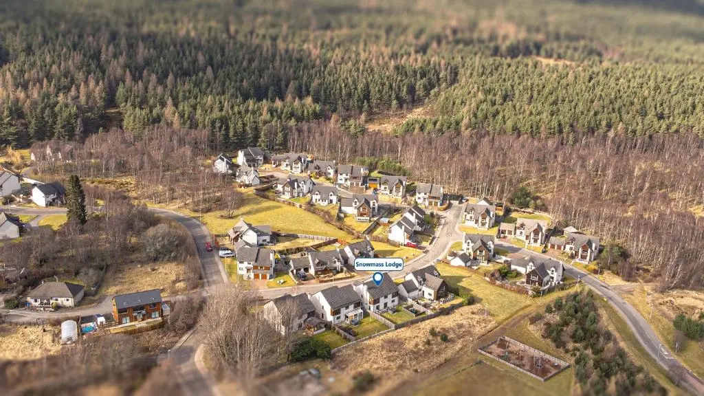 an aerial view of a small village on a hill at Snowmass Lodge - hot tub in Aviemore in Aviemore