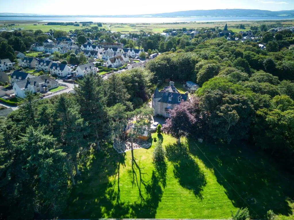 an aerial view of a small town with houses at Woodlands Bed and Breakfast in Dornoch