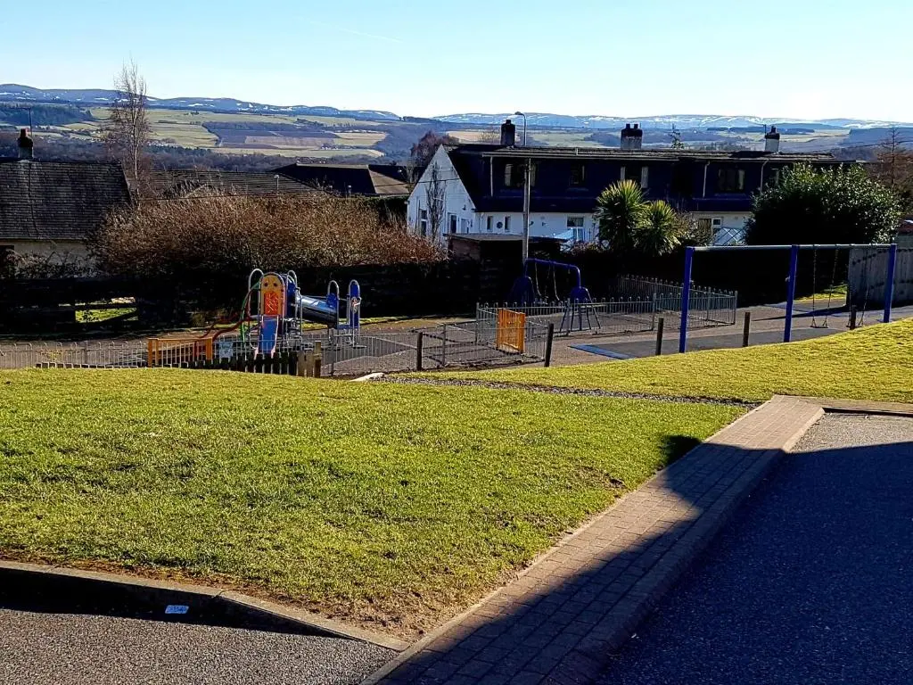 a park with a playground at Hill View 2 bedroom free parking in Inverness