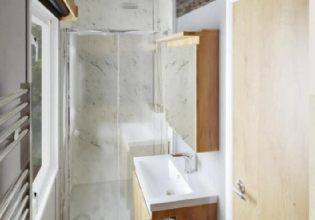 a bathroom with a sink and a shower at 2 Bed Inverness - Sleeps 4 - Parking - Wifi in Inverness