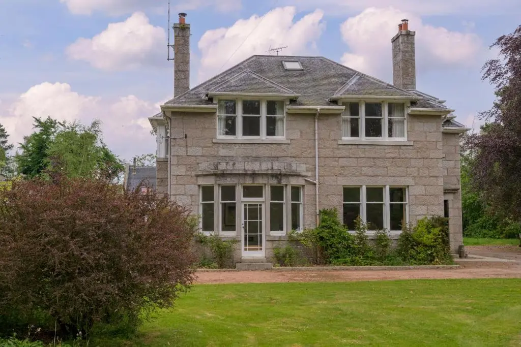 a large brick house with two chimneys at Haven Retreat Scotland - Large 4 Bed House with Woodland garden, Aboyne ,Royal Deeside in Aboyne