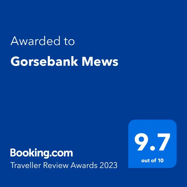 a blue screen with the text awarded to grosbark news at Gorsebank Mews in Inverness