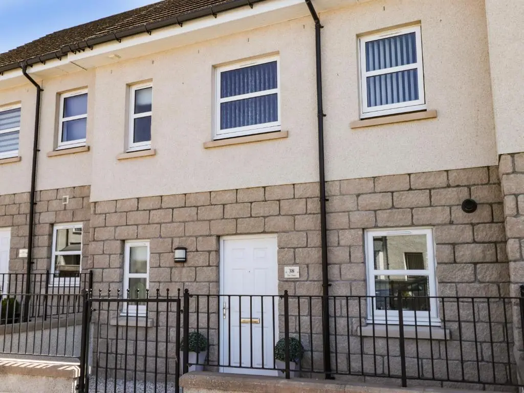 an apartment building with a white door at 38 The Views in Elgin