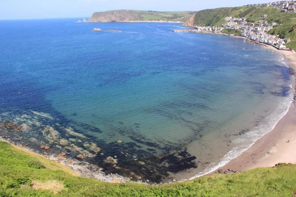 an aerial view of a beach and the ocean at Bellevue Holiday Cottage in Gardenstown
