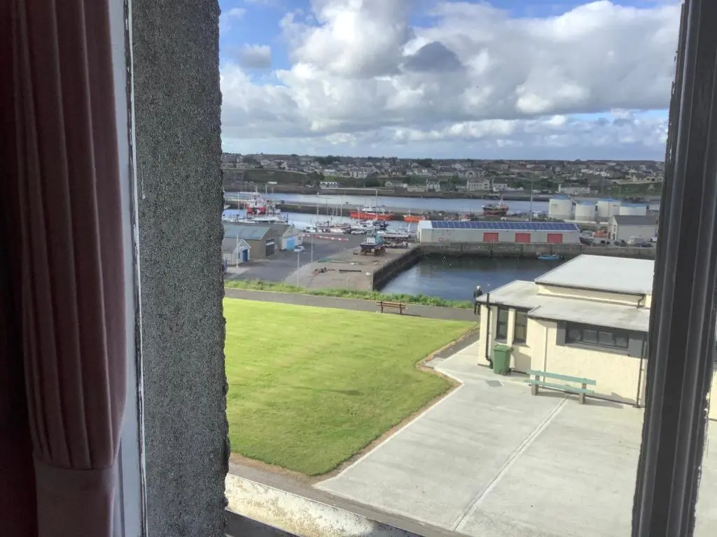 a view of a harbor from a window at Harbour View in Wick