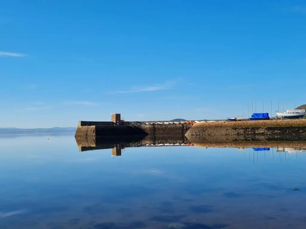 a bridge over a body of water with at Old Tavern House in Fortrose
