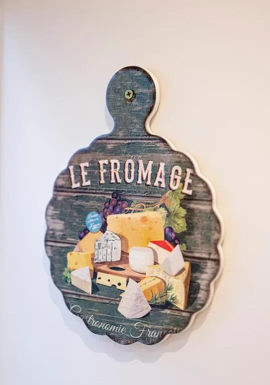 a sign that says le france with cheese and cheese at The Hideaway in Inverness
