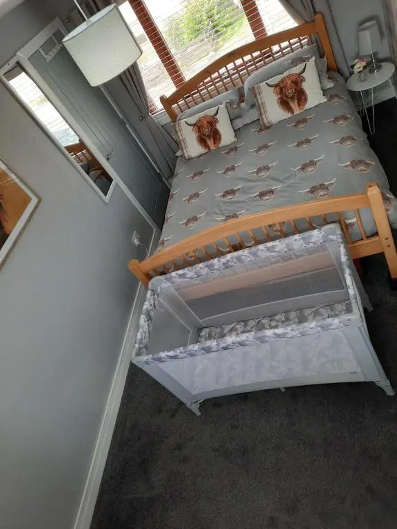 an overhead view of a bed in a room at Ella's Hoose in Wick