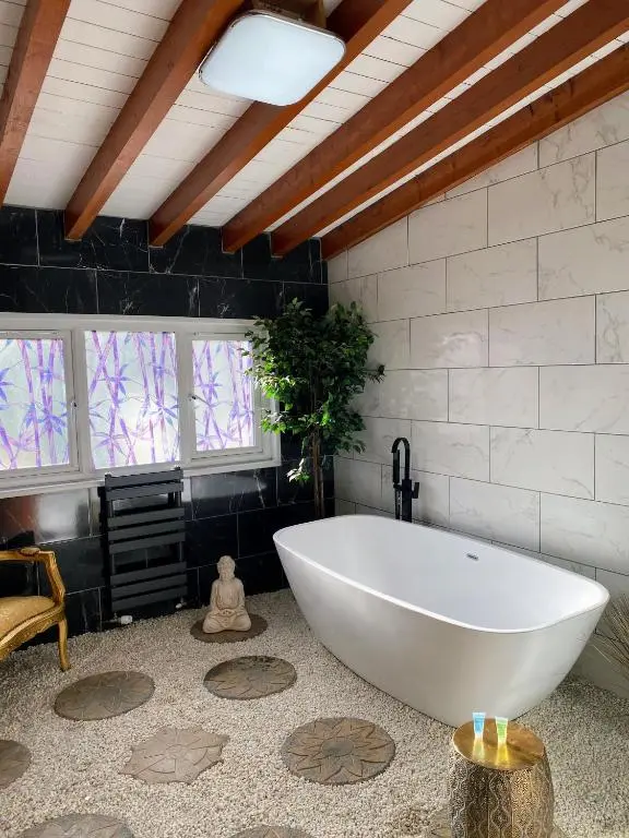 a large white tub in a room with windows at Kaoglen Zen-Feature Bath-Dunkeld-Route 500 in Balnald