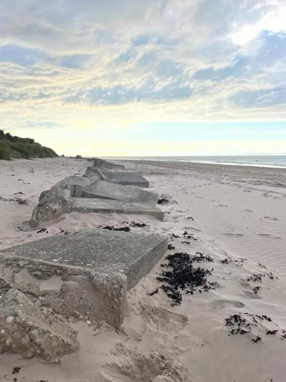 a sandy beach with steps in the sand at Dune View Caravan in Lossiemouth