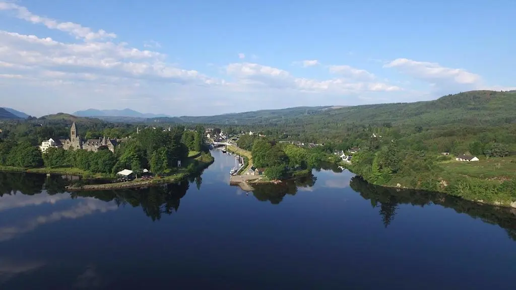 an aerial view of a river with a town and a city at The Cabin, Stronua. A beautiful 1 bedroom cabin. in Fort Augustus