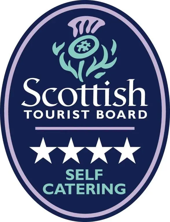 a sign for a scottish tourist board with stars at Cathwill - Cosy 4 Star Cottage - Cairngorm National Park in Newtonmore