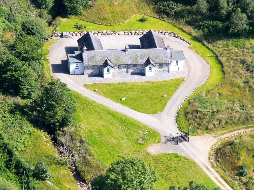 an aerial view of a house on a hill at Allt Na Criche - Ukc5762 in Laggan