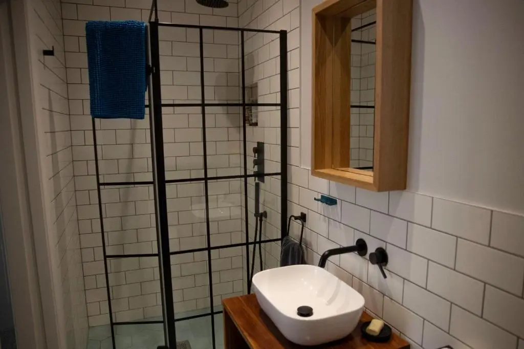 a bathroom with a sink and a shower at The old church house in Inverness