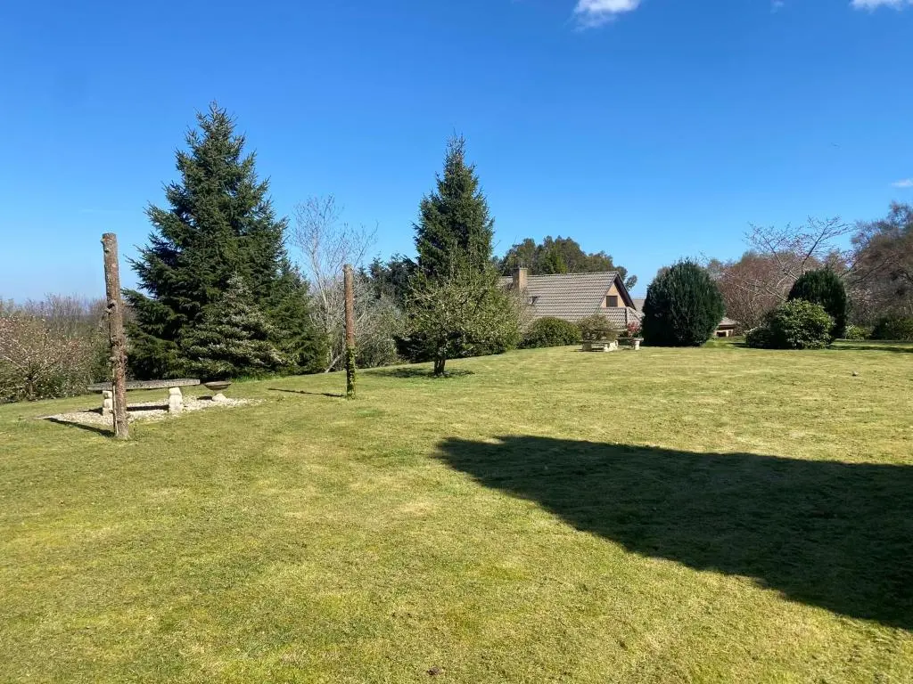 a large yard with trees and a house and a shadow at Drummond Neuk - Pets Welcome free, country setting, free onsite parking in Inverness
