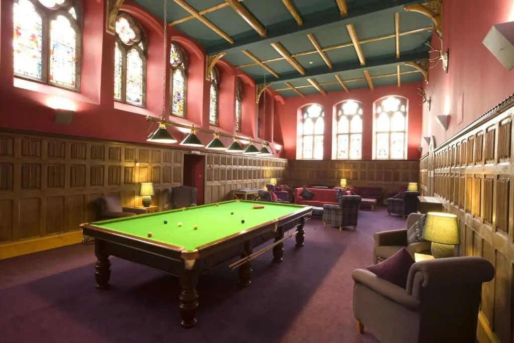a billiard room with a pool table in it at Raven Wing Apartments - Highland Club Scotland in Fort Augustus