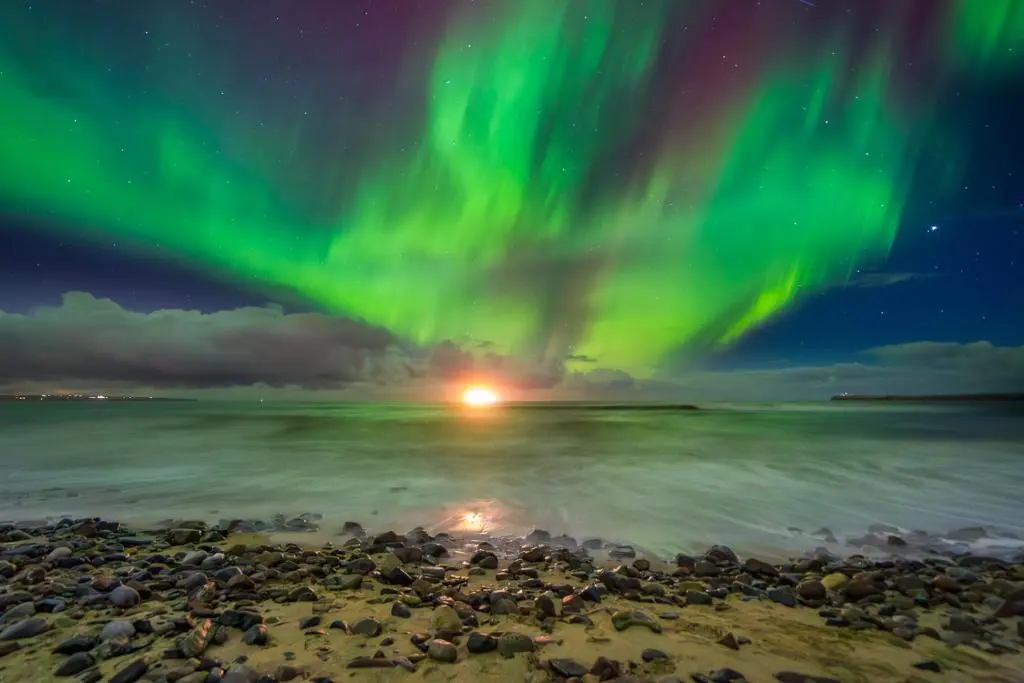 an image of the aurora borealis over a beach at Harbourside by Caithness Luxury Apartments NC500 - 2 Bedroom holiday home - Sleeps Work teams upto 2 & holiday makers upto 6 with bike store in Wick