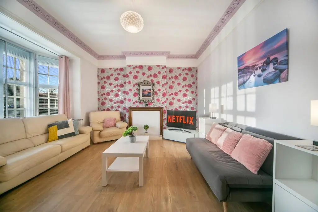 a living room with a couch and a table at Constancevilla B9 - Grampian Lettings Ltd in Aberdeen