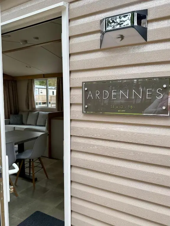 a restaurant sign on the side of a building at The Spey Van - Beautiful, luxury static caravan in Aberlour