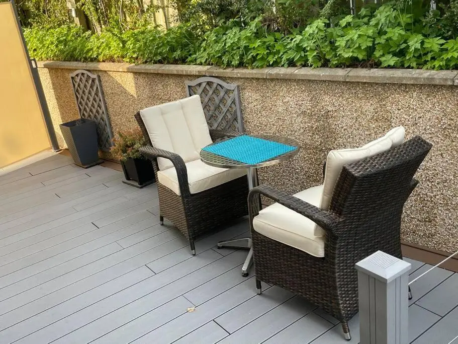 a table and chairs sitting on a patio at The Apartment in Nairn
