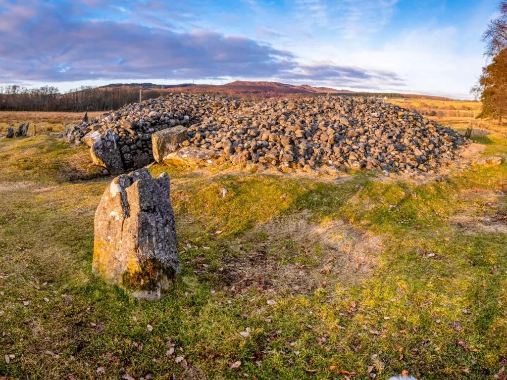 a large rock in the middle of a field at Holiday Home Achmony Number 8 by Interhome in Drumnadrochit